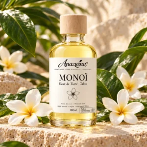 Monoï de Tahiti Anazwina 100 ml entouré de feuilles et de fleurs de tiaré.